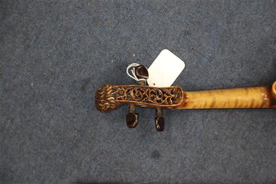 A decorative violin, bearing Gaspar da Salo label, body 14.5in., overall 23.5in., cased with a bow